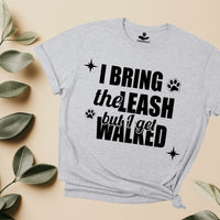 Load image into Gallery viewer, I bring the leash, but I get walked - Funny - T-shirt For Dog Moms
